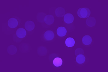 Abstract blur bokeh background. Defocused bokeh colorful background. Soft color blur on a black background. Beautiful colored bokeh lights
