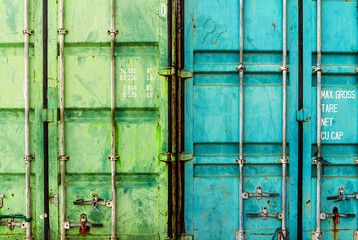 Blue and Green Locked Two Container Door Side by Side For Inspection at The Customs SeaPort Logistic Area