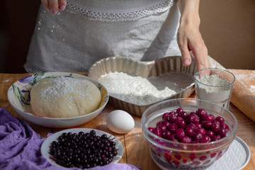 Making a pie from the dough. Cooking homemade flour products