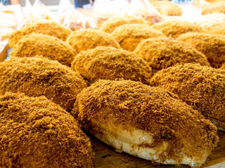 Abon or Meat Floss Sweet Bread on The Table Top Counter Display at Bread Store in Culinary Center. Selective Focus.
