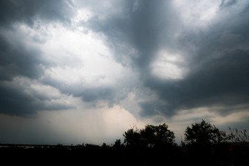 Obraz premium dark storm clouds with background,Dark clouds before a thunder-storm.
