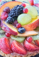 Delicious pie with fresh fruits, closeup