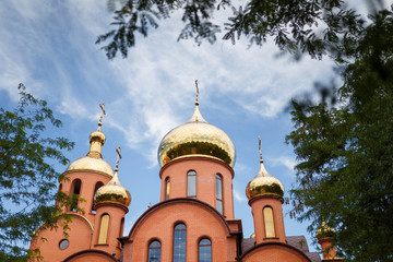 Fototapeta na wymiar orthodox church on the blue sky background