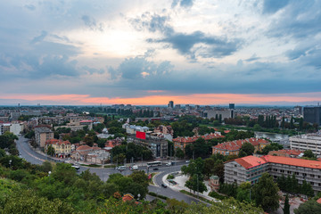 Summer sunset. Photo from Nebet tepe Hill in Plovdiv city, Bulgaria. Panoramic view with warm sunset. Ancient Plovdiv is UNESCO's World Heritage.