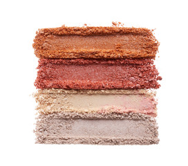 Broken eyeshadows in trendy shades isolated on white background