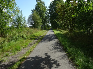 Smal path for running people and can also be used by bicycles