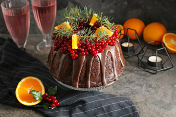 Tasty Christmas pie on grey table