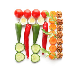 Quail eggs with nuts and vegetables on white background