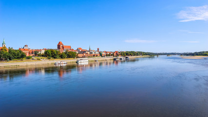 Naklejka na ściany i meble Panoramic view of Torun city and Wisla (Vistula) river with bridges. Poland, summer 2019
