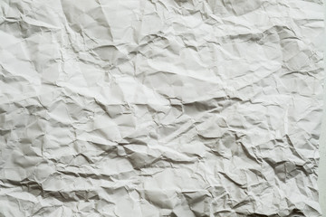 Blank sage green crumpled paper. Wrinkled texture. Abstract art background. Copy space.