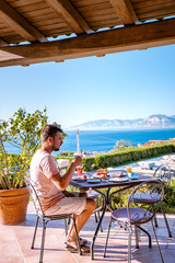 breakfast table with a view over the Orosei coast at Cala Gonone Sardinia Italy, 