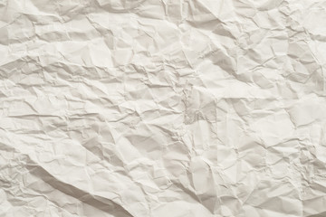 Ivory crumpled paper sheet. Cellulose industry. Abstract art background. Copy space.