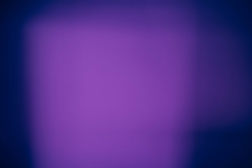 Blur violet glow. Defocused navy blue abstract art background. Colored fog light effect.