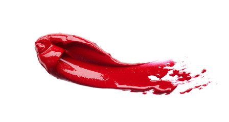 Smear and texture of red lipstick or acrylic paint isolated on white background.