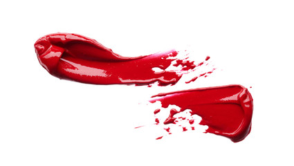 Smear and texture of red lipstick or acrylic paint isolated on white background.