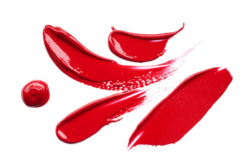 Smear and texture of red lipstick or acrylic paint isolated on white background.