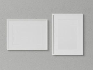 White rectangular frames hanging on a concrete wall mockup 3D rendering