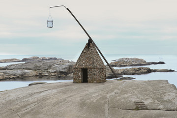 Lighthouse made by stones  at The End of the Earth on Tjome in Norway. Verdens Ende (World's End)  is one of the most popular scenic places in the area, with panoramic views.