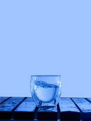 glass of water pouring spray