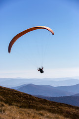 Paraglider fly in sky
