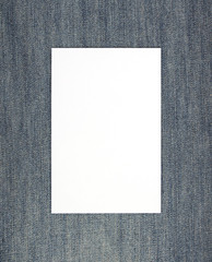 Blank White Card on Jeans Background