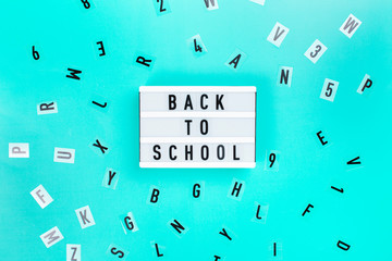 Back to school concept. Letters on blue background.