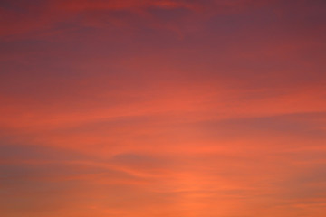 Naklejka na ściany i meble Sky at sunset. Photo red pink evening sky.