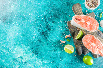 Raw salmon fish steaks with spices