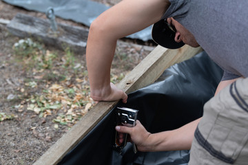 Handy man using a staple gun