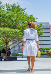 Woman walking in the marina bay area