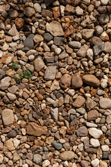 Many little brown stones texture background
