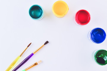 Brushes and paints for drawing and hobby. Bright color.