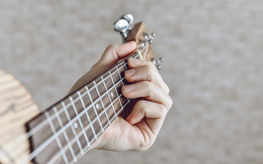 Playing guitar. Musical instrument guitar.