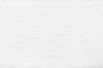 Fototapeta premium Cardboard white texture close-up. Light old paper background. Grunge concrete wall. Vintage blank wallpaper.