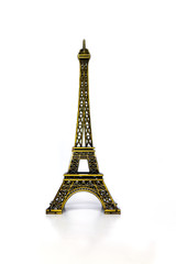 Fototapeta na wymiar Eiffel tower souvenir isolated on white background