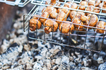 marinated mushrooms champignons fried on the grill