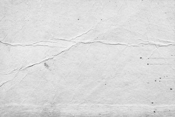 Obraz premium Cardboard white texture close-up. Light old paper background. Grunge concrete wall. Vintage blank wallpaper.