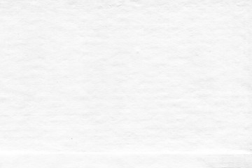 Fototapeta premium Cardboard white texture close-up. Light old paper background. Grunge concrete wall. Vintage blank wallpaper.