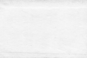 Cardboard white texture close-up. Light old paper background. Grunge concrete wall. Vintage blank wallpaper.