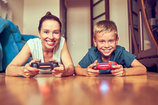 Young Mom And Son Play Video Games