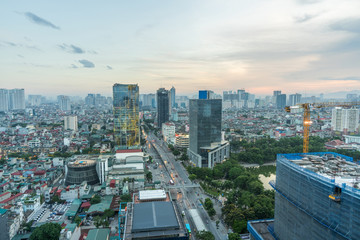 Fototapeta na wymiar Aerial skyline view of Hanoi. Hanoi cityscape at twilight at Lang Ha street, Ba Dinh district
