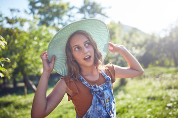 Cute ten year old girl posing in nature.