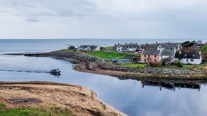 Boat returning to Brora harbour