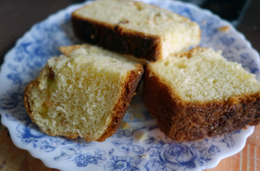 Pieces of cake on plate with blur effect.