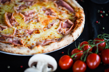tasty italian pizza with prosciutto & cheese