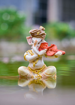 Lord Ganesha with violin