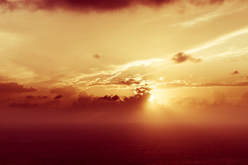 Fototapeta na wymiar Sunset over sea surface