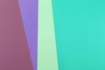 Paper empty purple, green, brown background, geometrically located. Color blank for presentations, copy space.