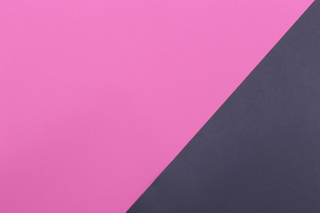 Paper pink, black empty background, geometrically located. Color blank for presentations, copy space.