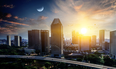 Aerial view of city modern office buildings, highway and parks